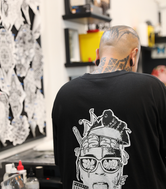 tattoo artist in studio preparing for work