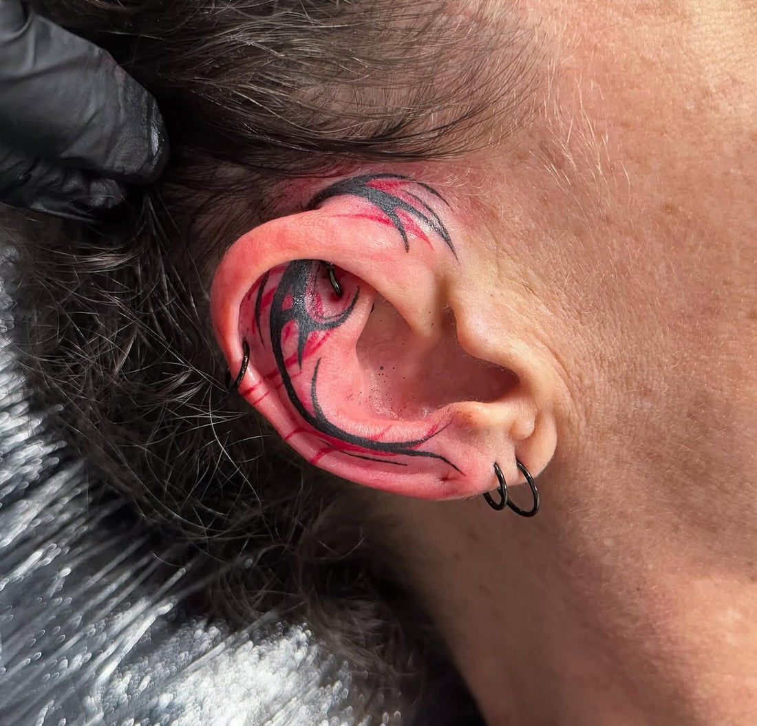 tribal style ear tattoo