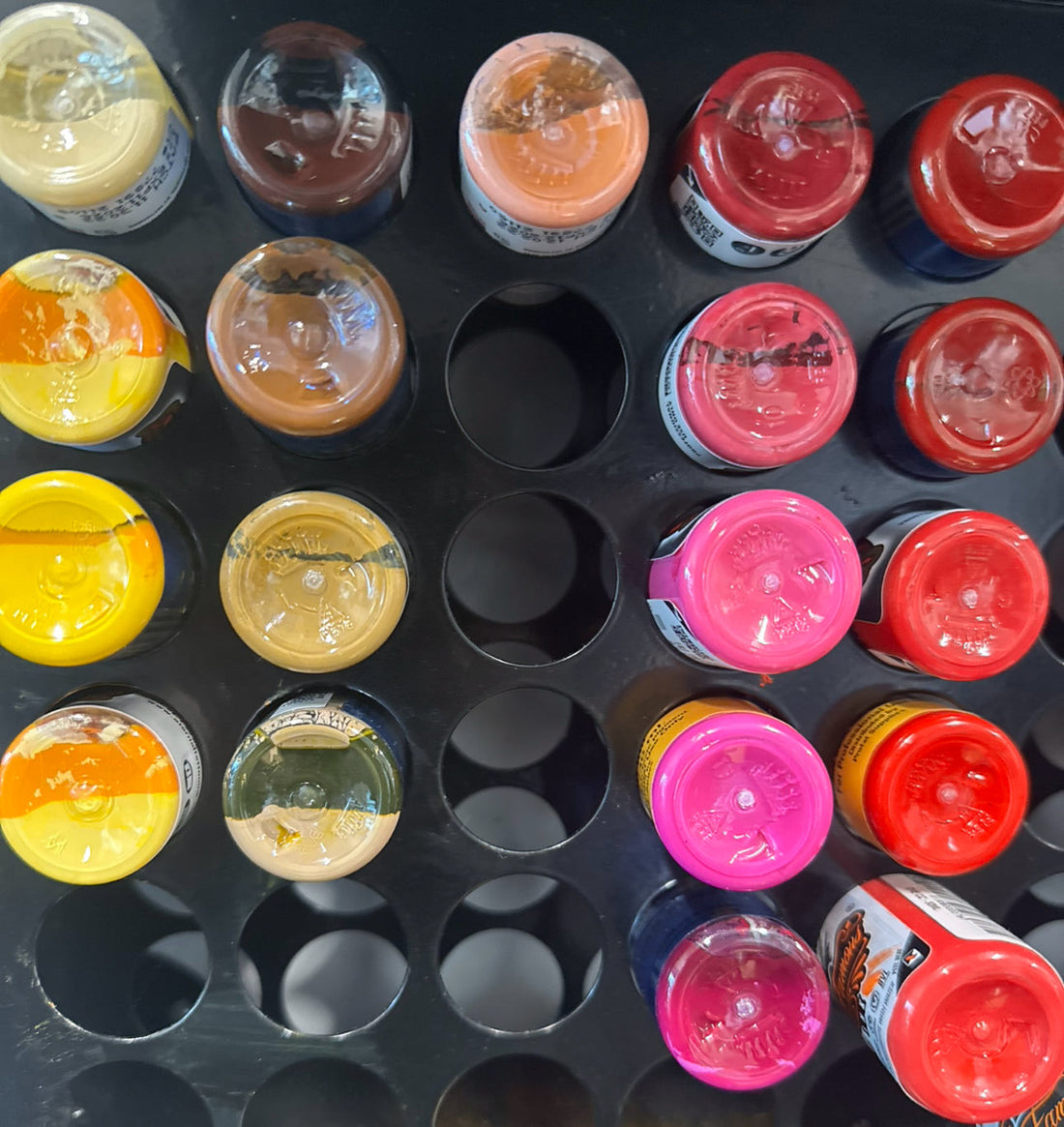 bottles of tattoo ink on wall